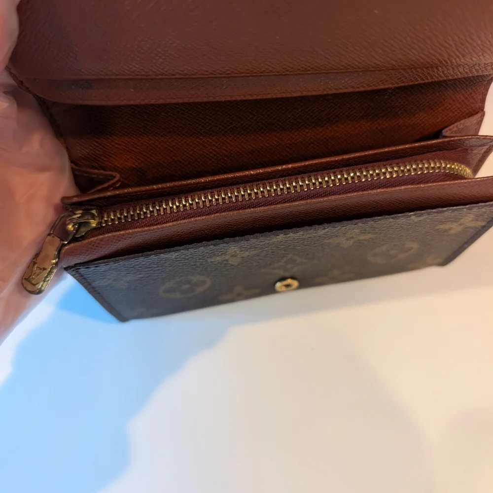 Louis Vuitton Porte Monnaie Tressor Trifold Zippy Wallet